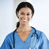 CNA providing care and patient testing in Kansas facility